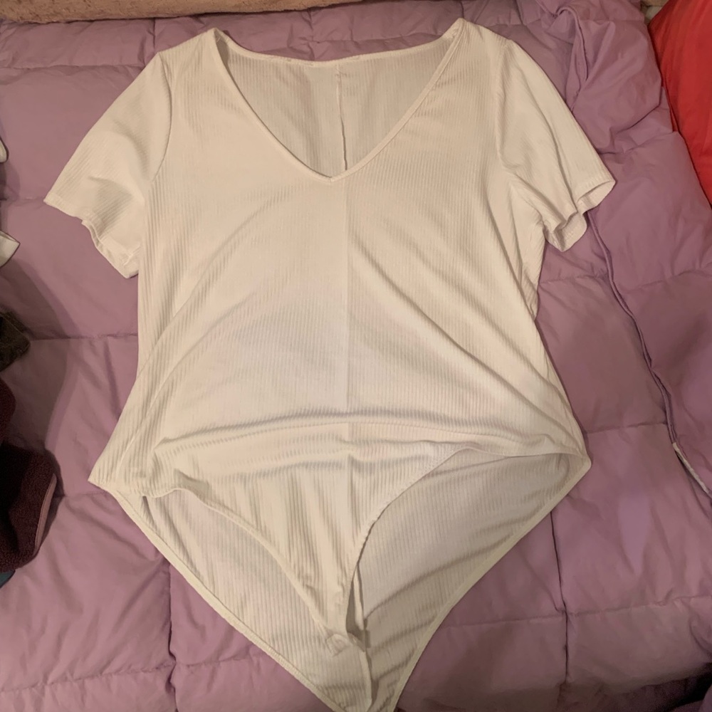 Forever 21, white body suit. Never worn.